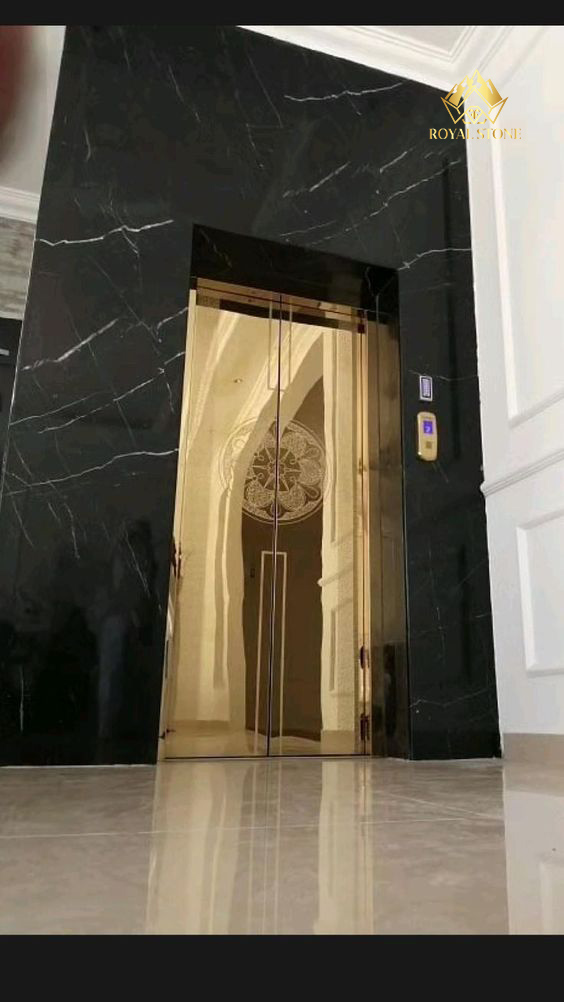 Stone cladding, elevator